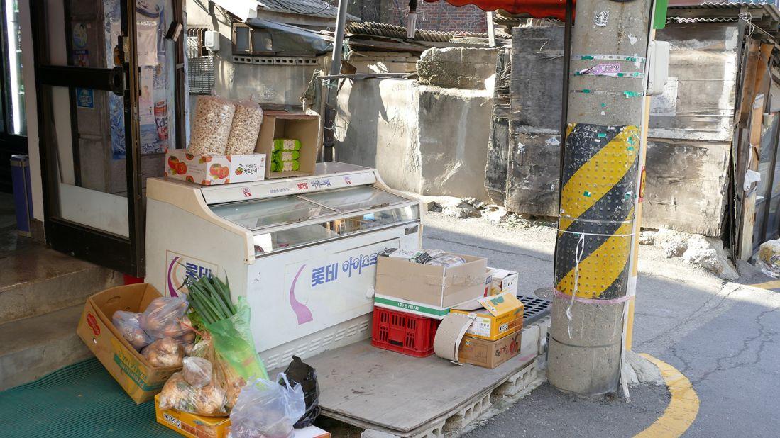 <strong>Photo hotspot: </strong>Featuring the same old school Lotte ice cream fridge that appears in the movie, the front door of Doijissal Supermarket has become a popular photo shoot spot thanks to the film.